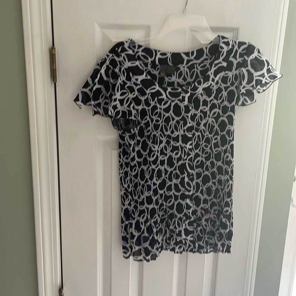 Woman’s sheer top size L